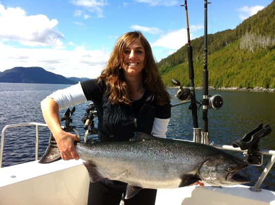 Nesia Haynes holding a 28lb Chinook caught in the Douglas Channel